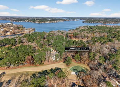 STUNNING VIEWS OF THE 7TH HOLE GREEN ON THE RENOWNED JACK on Great Waters Course At Reynolds Plantation in Georgia - for sale on GolfHomes.com, golf home, golf lot