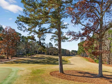 STUNNING VIEWS OF THE 7TH HOLE GREEN ON THE RENOWNED JACK on Great Waters Course At Reynolds Plantation in Georgia - for sale on GolfHomes.com, golf home, golf lot