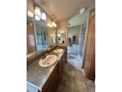 This spacious and beautiful 3-bedroom, 2 bath home features two on Four Lakes Golf Club in Florida - for sale on GolfHomes.com, golf home, golf lot