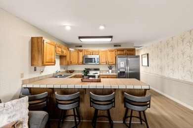 Fully furnished, main-level, low-vacancy investment condo in one on Sunbrook Golf Course in Utah - for sale on GolfHomes.com, golf home, golf lot