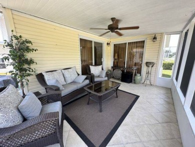 This spacious and beautiful 3-bedroom, 2 bath home features two on Four Lakes Golf Club in Florida - for sale on GolfHomes.com, golf home, golf lot