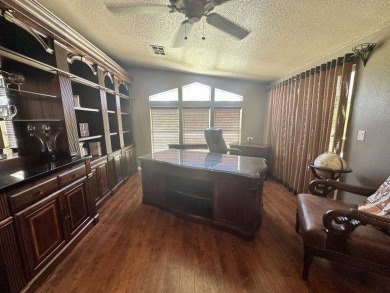 This spacious and beautiful 3-bedroom, 2 bath home features two on Four Lakes Golf Club in Florida - for sale on GolfHomes.com, golf home, golf lot