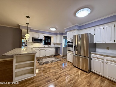 Welcome to a stunning entertainer's paradise! This beautiful on Roanoke Country Club in North Carolina - for sale on GolfHomes.com, golf home, golf lot