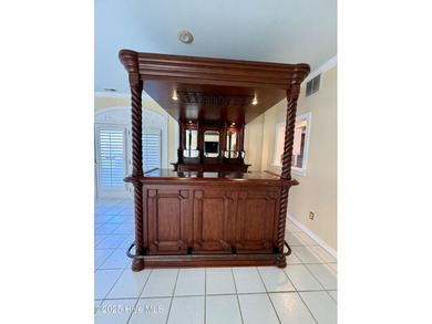 Welcome to a stunning entertainer's paradise! This beautiful on Roanoke Country Club in North Carolina - for sale on GolfHomes.com, golf home, golf lot