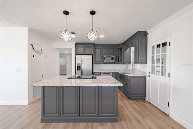 Tucked away on a quiet, dead-end street in the heart of on Dubsdread Golf Course in Florida - for sale on GolfHomes.com, golf home, golf lot