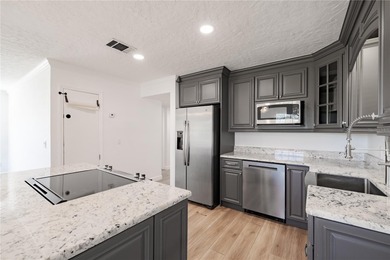 Tucked away on a quiet, dead-end street in the heart of on Dubsdread Golf Course in Florida - for sale on GolfHomes.com, golf home, golf lot