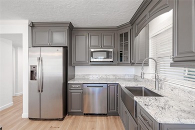 Tucked away on a quiet, dead-end street in the heart of on Dubsdread Golf Course in Florida - for sale on GolfHomes.com, golf home, golf lot