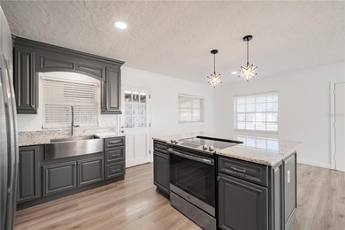 Tucked away on a quiet, dead-end street in the heart of on Dubsdread Golf Course in Florida - for sale on GolfHomes.com, golf home, golf lot