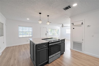 Tucked away on a quiet, dead-end street in the heart of on Dubsdread Golf Course in Florida - for sale on GolfHomes.com, golf home, golf lot