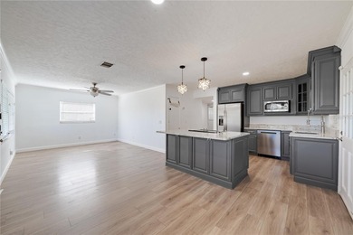 Tucked away on a quiet, dead-end street in the heart of on Dubsdread Golf Course in Florida - for sale on GolfHomes.com, golf home, golf lot