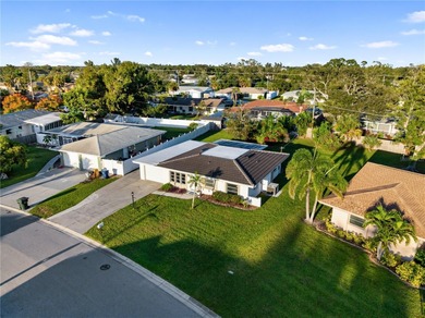 Get ready to fall in love with this absolutely charming and on Venice East Golf Club in Florida - for sale on GolfHomes.com, golf home, golf lot
