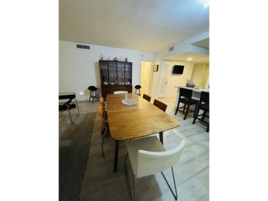 Spacious and bright 3 bedrooms 2 bathrooms condo located in the on Palm-Aire Country Club and Resort - Palms in Florida - for sale on GolfHomes.com, golf home, golf lot