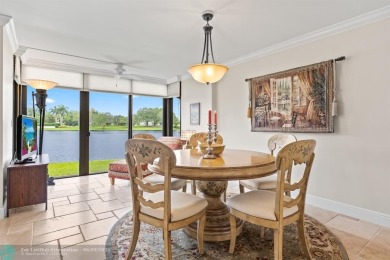 Unwind in luxury at this beautifully updated first floor on Boca West Golf and Country Club in Florida - for sale on GolfHomes.com, golf home, golf lot