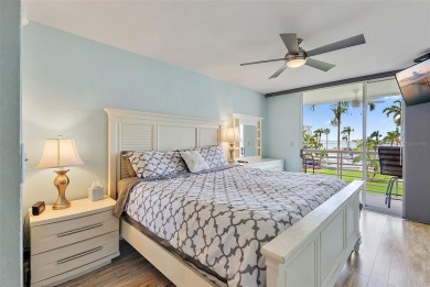 Exceptional craftsmanship and stunning upgrades make this a on Isla Del Sol Yacht and Country Club in Florida - for sale on GolfHomes.com, golf home, golf lot
