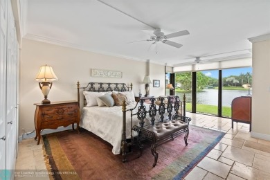 Unwind in luxury at this beautifully updated first floor on Boca West Golf and Country Club in Florida - for sale on GolfHomes.com, golf home, golf lot