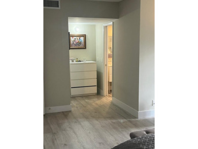Spacious and bright 3 bedrooms 2 bathrooms condo located in the on Palm-Aire Country Club and Resort - Palms in Florida - for sale on GolfHomes.com, golf home, golf lot