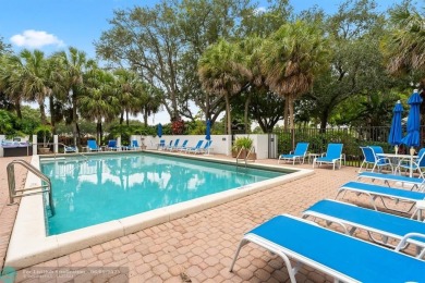 Unwind in luxury at this beautifully updated first floor on Boca West Golf and Country Club in Florida - for sale on GolfHomes.com, golf home, golf lot