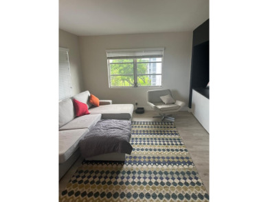 Spacious and bright 3 bedrooms 2 bathrooms condo located in the on Palm-Aire Country Club and Resort - Palms in Florida - for sale on GolfHomes.com, golf home, golf lot