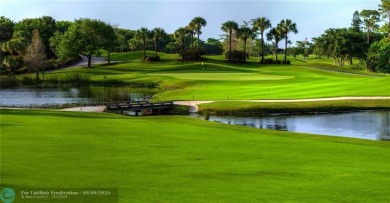 Unwind in luxury at this beautifully updated first floor on Boca West Golf and Country Club in Florida - for sale on GolfHomes.com, golf home, golf lot