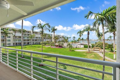 Exceptional craftsmanship and stunning upgrades make this a on Isla Del Sol Yacht and Country Club in Florida - for sale on GolfHomes.com, golf home, golf lot