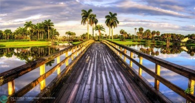 Unwind in luxury at this beautifully updated first floor on Boca West Golf and Country Club in Florida - for sale on GolfHomes.com, golf home, golf lot