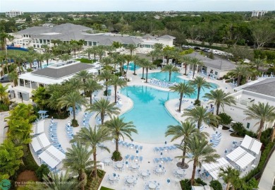 Unwind in luxury at this beautifully updated first floor on Boca West Golf and Country Club in Florida - for sale on GolfHomes.com, golf home, golf lot
