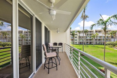 Exceptional craftsmanship and stunning upgrades make this a on Isla Del Sol Yacht and Country Club in Florida - for sale on GolfHomes.com, golf home, golf lot