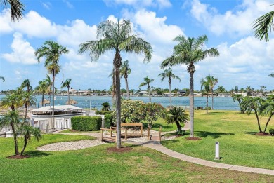 Exceptional craftsmanship and stunning upgrades make this a on Isla Del Sol Yacht and Country Club in Florida - for sale on GolfHomes.com, golf home, golf lot