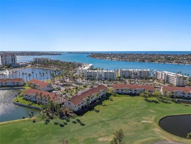 Exceptional craftsmanship and stunning upgrades make this a on Isla Del Sol Yacht and Country Club in Florida - for sale on GolfHomes.com, golf home, golf lot