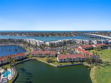 Exceptional craftsmanship and stunning upgrades make this a on Isla Del Sol Yacht and Country Club in Florida - for sale on GolfHomes.com, golf home, golf lot