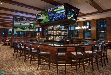 Unwind in luxury at this beautifully updated first floor on Boca West Golf and Country Club in Florida - for sale on GolfHomes.com, golf home, golf lot