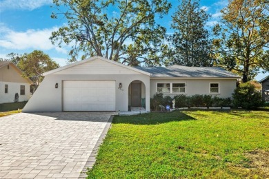 Discover this stunning 3-bedroom, 2-bathroom home with a 2-car on Heather Golf and Country Club in Florida - for sale on GolfHomes.com, golf home, golf lot