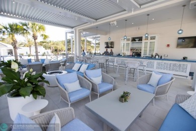 Unwind in luxury at this beautifully updated first floor on Boca West Golf and Country Club in Florida - for sale on GolfHomes.com, golf home, golf lot