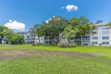 Spacious and bright 3 bedrooms 2 bathrooms condo located in the on Palm-Aire Country Club and Resort - Palms in Florida - for sale on GolfHomes.com, golf home, golf lot