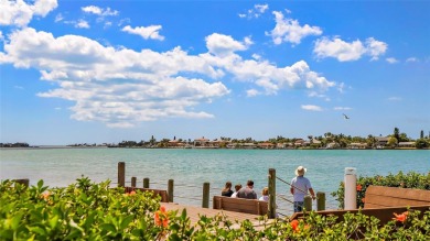 Exceptional craftsmanship and stunning upgrades make this a on Isla Del Sol Yacht and Country Club in Florida - for sale on GolfHomes.com, golf home, golf lot