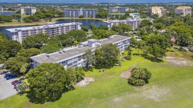 Spacious and bright 3 bedrooms 2 bathrooms condo located in the on Palm-Aire Country Club and Resort - Palms in Florida - for sale on GolfHomes.com, golf home, golf lot