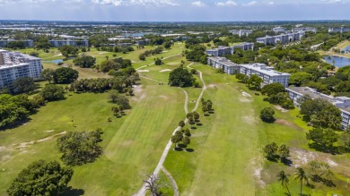 Spacious and bright 3 bedrooms 2 bathrooms condo located in the on Palm-Aire Country Club and Resort - Palms in Florida - for sale on GolfHomes.com, golf home, golf lot