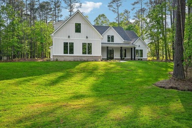 THERE'S SOMETHING MAGICAL ABOUT STEPPING INTO A NEW HOME, A on Harbor Club Golf and Country Club in Georgia - for sale on GolfHomes.com, golf home, golf lot
