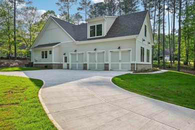 THERE'S SOMETHING MAGICAL ABOUT STEPPING INTO A NEW HOME, A on Harbor Club Golf and Country Club in Georgia - for sale on GolfHomes.com, golf home, golf lot