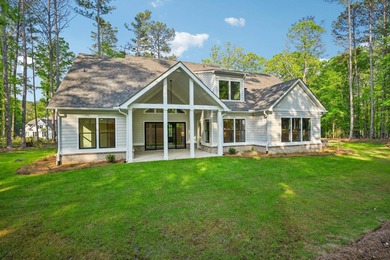 THERE'S SOMETHING MAGICAL ABOUT STEPPING INTO A NEW HOME, A on Harbor Club Golf and Country Club in Georgia - for sale on GolfHomes.com, golf home, golf lot