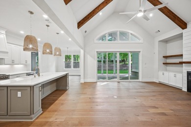 THERE'S SOMETHING MAGICAL ABOUT STEPPING INTO A NEW HOME, A on Harbor Club Golf and Country Club in Georgia - for sale on GolfHomes.com, golf home, golf lot