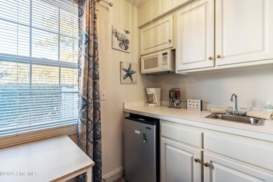 This is a rare opportunity to own this 1st floor 2 BR/2BA end on Brunswick Plantation and Golf Resorts in North Carolina - for sale on GolfHomes.com, golf home, golf lot