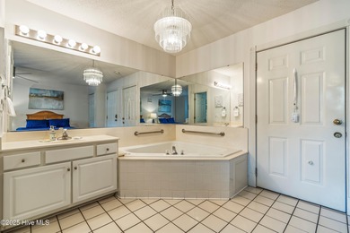 This is a rare opportunity to own this 1st floor 2 BR/2BA end on Brunswick Plantation and Golf Resorts in North Carolina - for sale on GolfHomes.com, golf home, golf lot