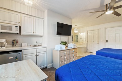 This is a rare opportunity to own this 1st floor 2 BR/2BA end on Brunswick Plantation and Golf Resorts in North Carolina - for sale on GolfHomes.com, golf home, golf lot