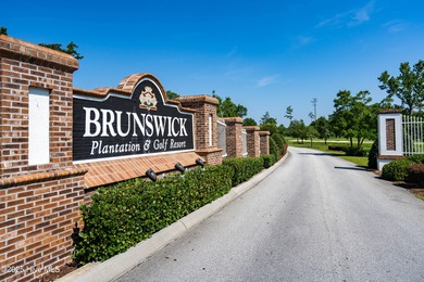 This is a rare opportunity to own this 1st floor 2 BR/2BA end on Brunswick Plantation and Golf Resorts in North Carolina - for sale on GolfHomes.com, golf home, golf lot