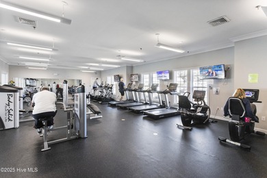 This is a rare opportunity to own this 1st floor 2 BR/2BA end on Brunswick Plantation and Golf Resorts in North Carolina - for sale on GolfHomes.com, golf home, golf lot