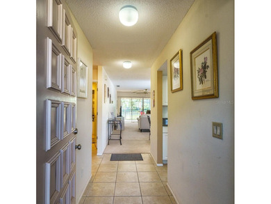 Escape the cold and enjoy easy, carefree Florida living in this on The Meadows Golf and Country Club in Florida - for sale on GolfHomes.com, golf home, golf lot