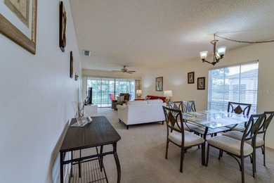 Escape the cold and enjoy easy, carefree Florida living in this on The Meadows Golf and Country Club in Florida - for sale on GolfHomes.com, golf home, golf lot