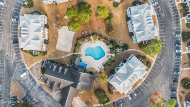 This is a rare opportunity to own this 1st floor 2 BR/2BA end on Brunswick Plantation and Golf Resorts in North Carolina - for sale on GolfHomes.com, golf home, golf lot