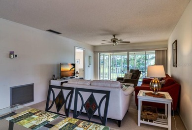 Escape the cold and enjoy easy, carefree Florida living in this on The Meadows Golf and Country Club in Florida - for sale on GolfHomes.com, golf home, golf lot